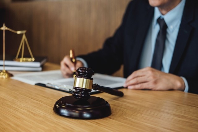 lawyer signing document