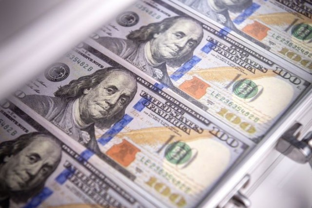 hundred dollar bills in briefcase