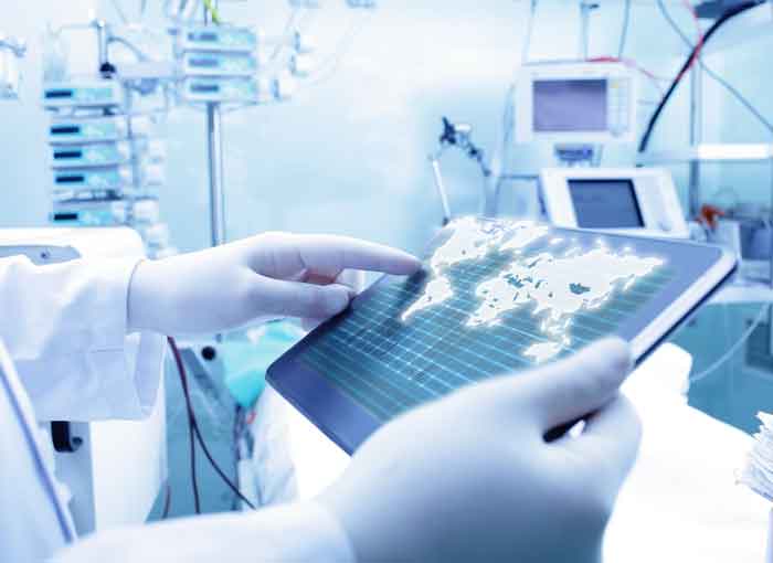 Hands holding medical device