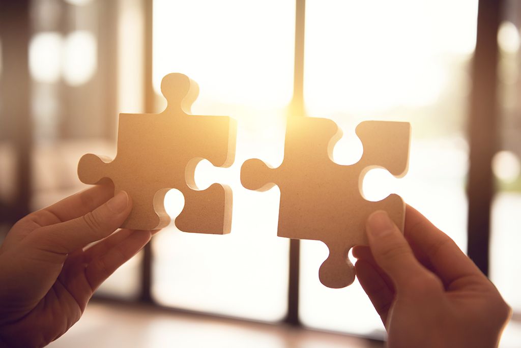 image of two puzzle pieces that fit together