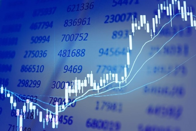 Close-up of a loose pile of coins stock photo used by Woodruff Sawyer.