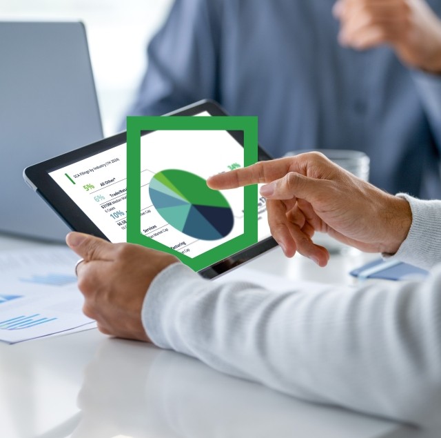 man explaining chart on tablet