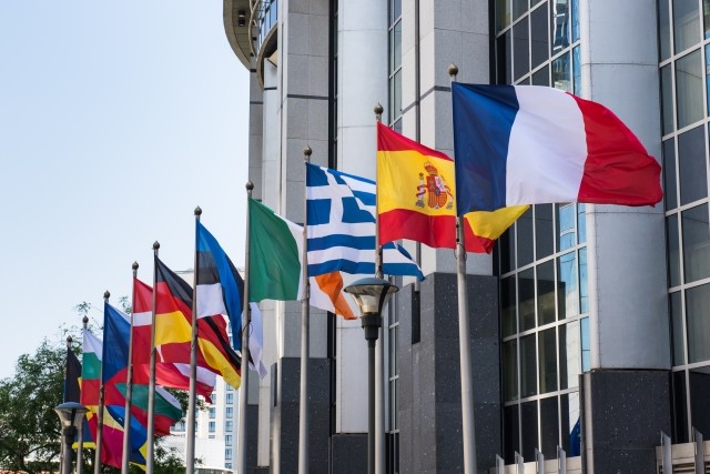 The flags of the member countries of the European Union in a row in Brussels, Belgium