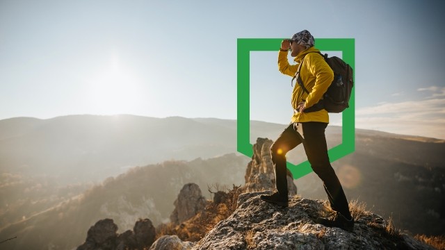 hiker on top of mountain